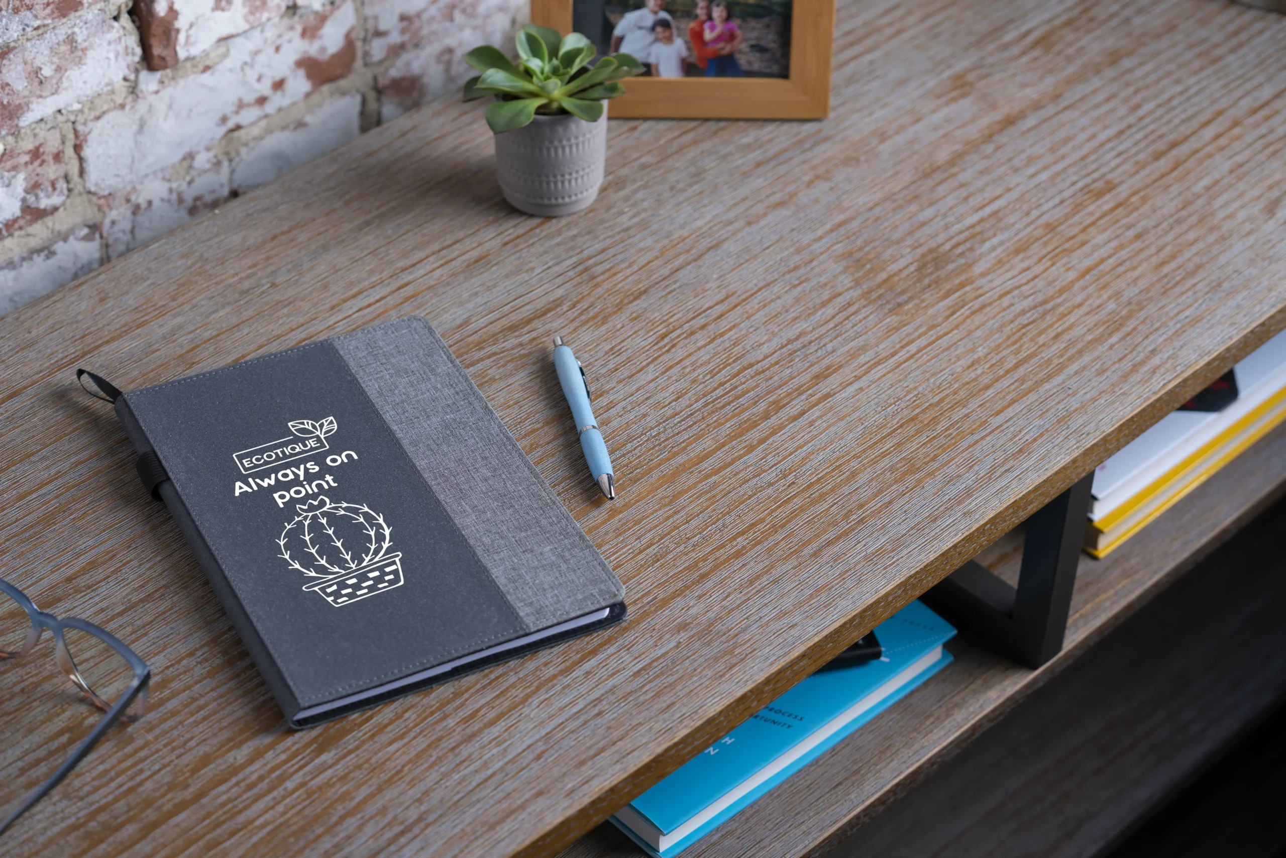 Journal and pen sitting on a desk