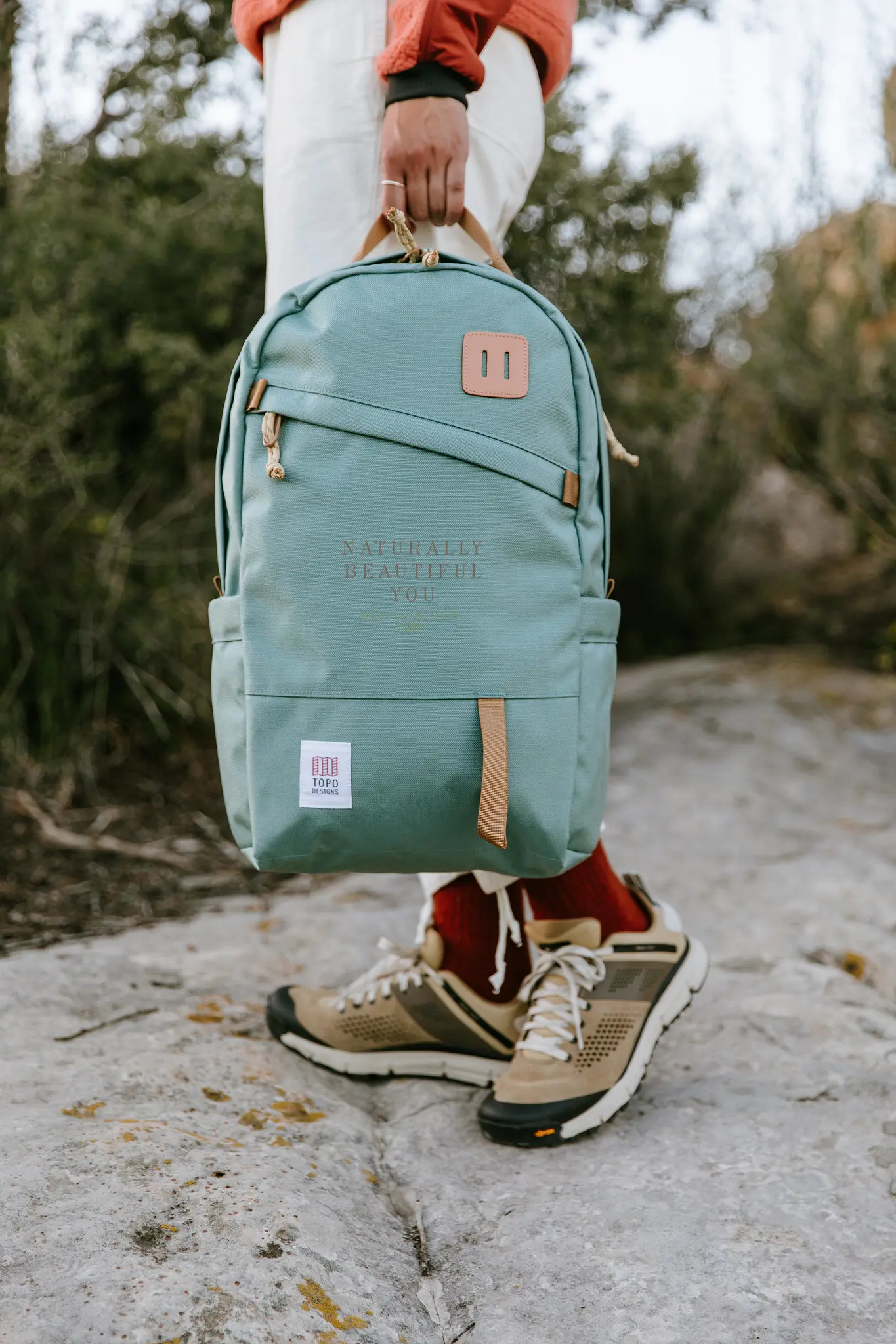 Woman holding a backpack